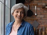 Woman smiling with dentures