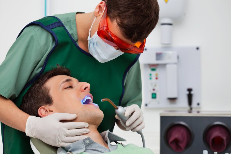 man smiling in dentist chair